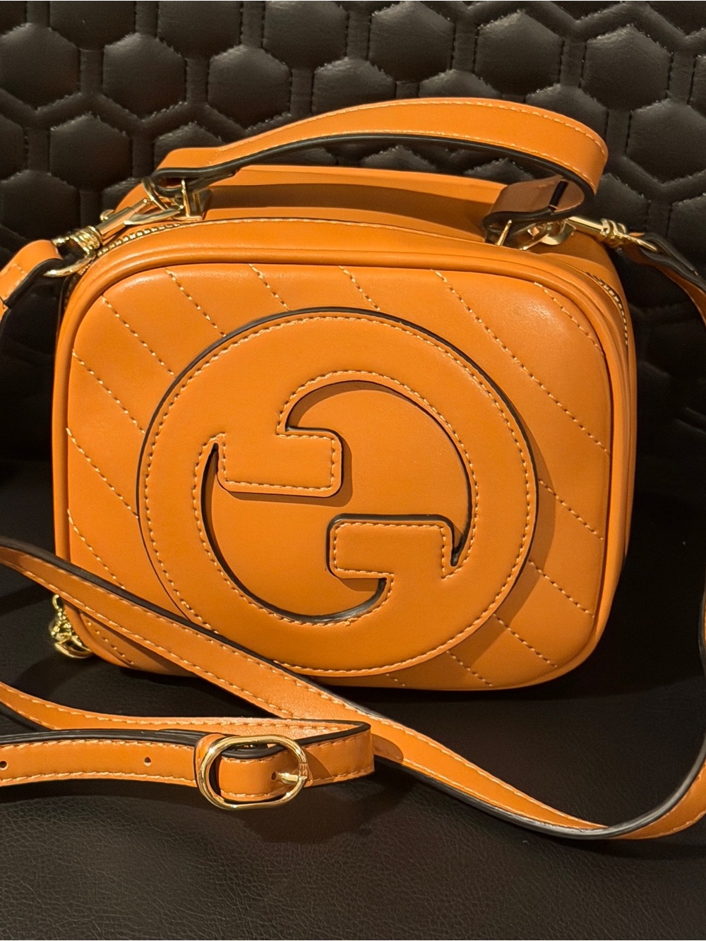 Brown Quilted Crossbody Bag with Interlocking Logo